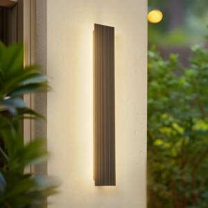 Lucande LED vonkajšie nástenné svietidlo Melira, dĺžka 60 cm, tmavo sivá