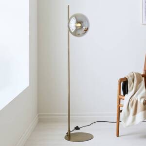 Stojacia lampa Dione, mosadzná/dymovo sivá, sklo, železo